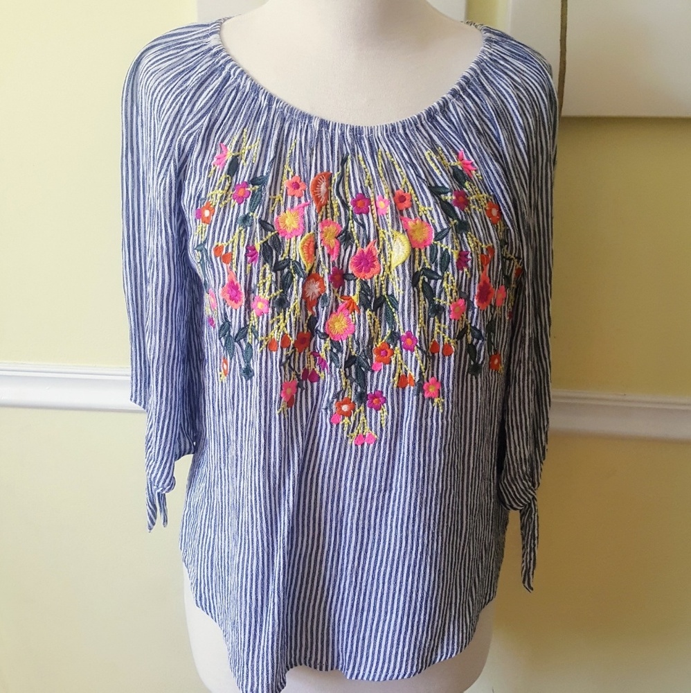 Flowy floral embroidered top.
